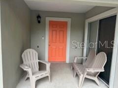 property entrance featuring stucco siding