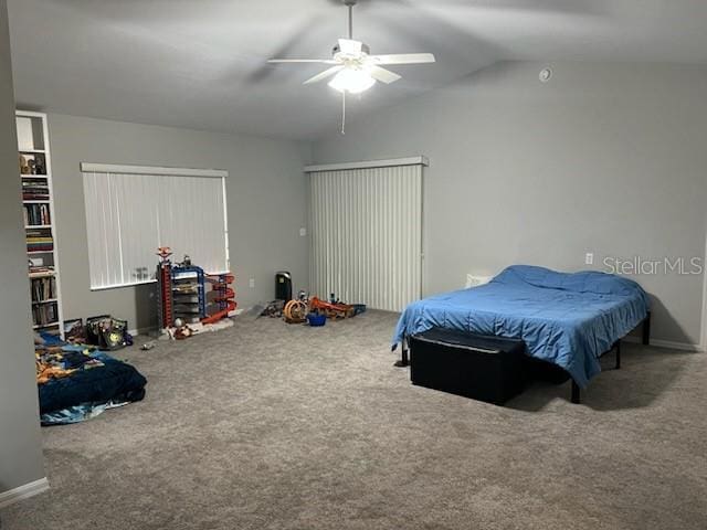 carpeted bedroom with lofted ceiling and ceiling fan