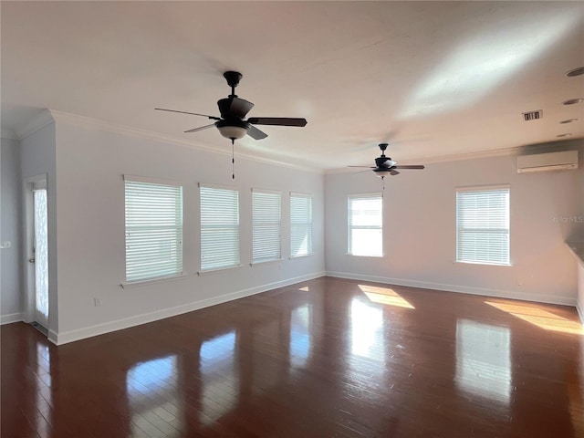 unfurnished room with ornamental molding, dark wood-type flooring, baseboards, and a wall mounted AC