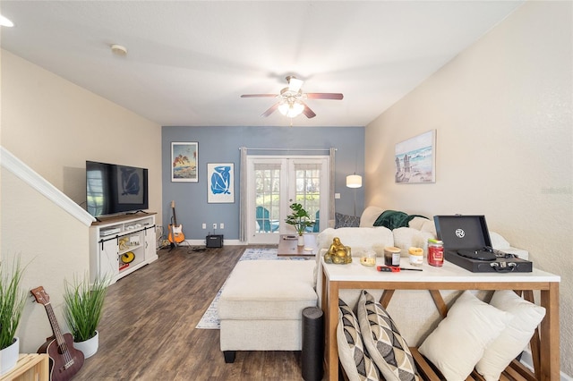 living room featuring french doors, ceiling fan, baseboards, and wood finished floors