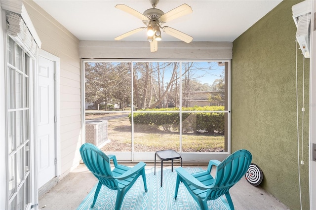 sunroom / solarium with ceiling fan