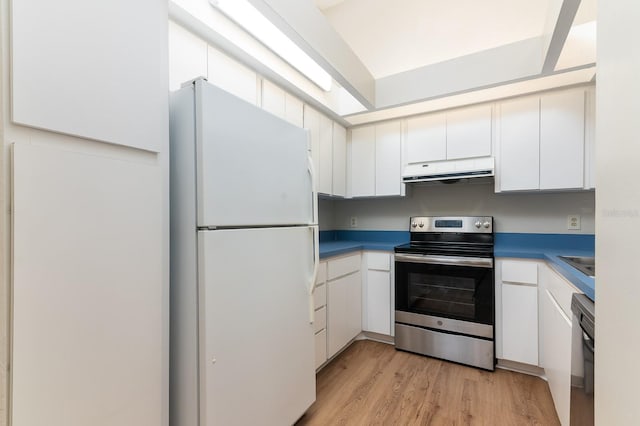 kitchen with white cabinets, under cabinet range hood, light wood-style flooring, and stainless steel appliances