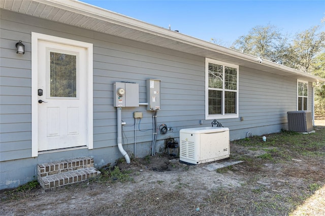 exterior space with entry steps and central AC