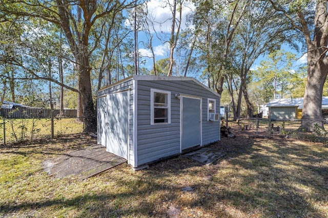 view of shed featuring a fenced backyard