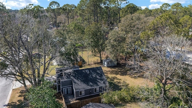 bird's eye view with a forest view