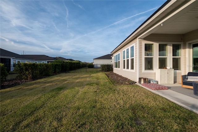 view of yard featuring fence