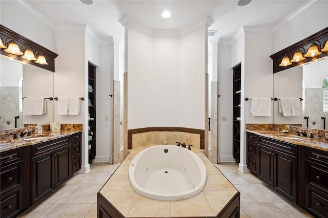 full bathroom featuring a whirlpool tub, a sink, two vanities, and ornamental molding