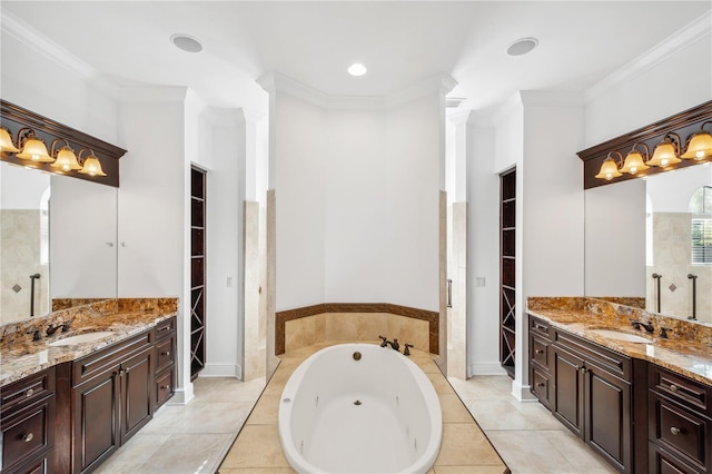 bathroom featuring a sink, two vanities, a tub with jets, and crown molding