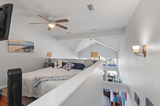 bedroom featuring carpet floors, visible vents, vaulted ceiling, and ceiling fan