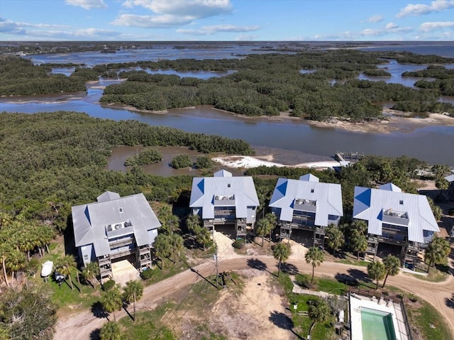 bird's eye view featuring a water view and a view of trees