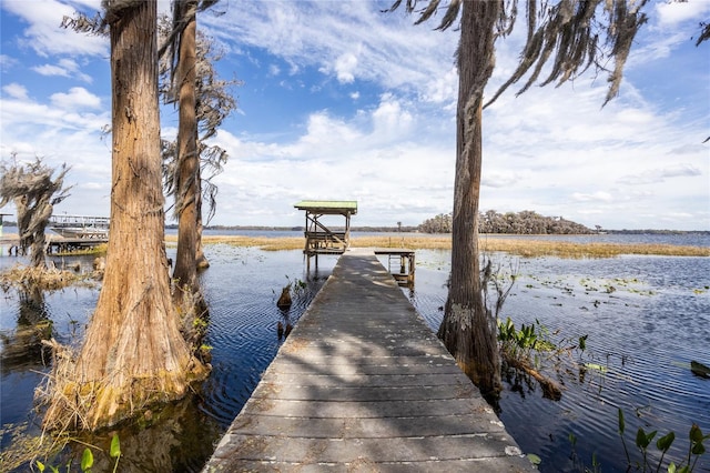 view of dock with a water view