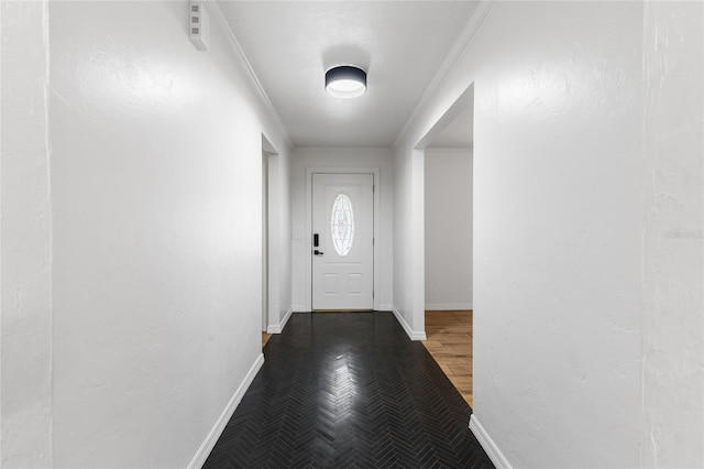 4031 NW 75th St, Gainesville, FL 32606 - entryway featuring baseboards, ornamental molding, and wood finished floors