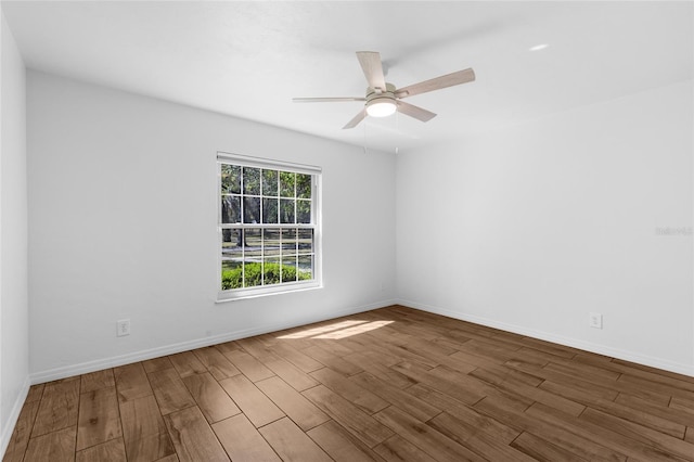 4031 NW 75th St, Gainesville, FL 32606 - empty room featuring baseboards, ceiling fan, and wood finished floors