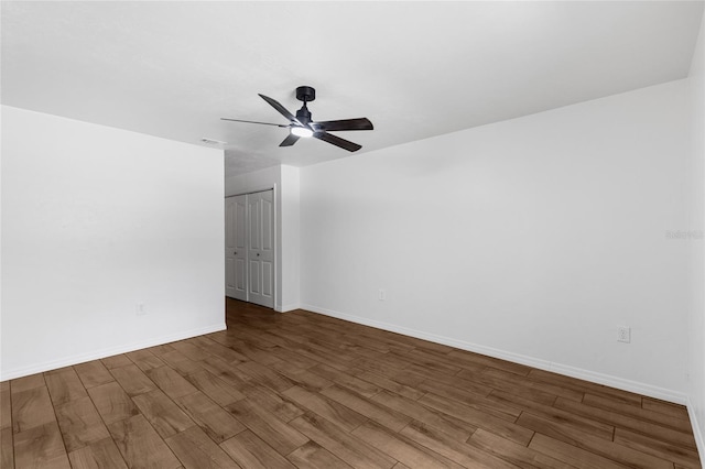 4031 NW 75th St, Gainesville, FL 32606 - empty room with a ceiling fan, visible vents, baseboards, and wood finished floors