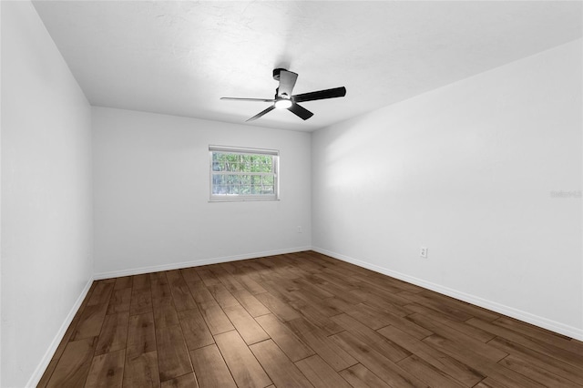 4031 NW 75th St, Gainesville, FL 32606 - empty room featuring dark wood finished floors, baseboards, and a ceiling fan