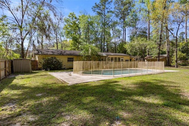 4031 NW 75th St, Gainesville, FL 32606 - exterior space with a patio area, a lawn, fence, and a fenced in pool