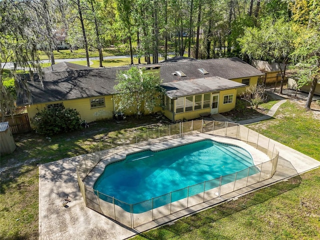 4031 NW 75th St, Gainesville, FL 32606 - view of pool featuring a lawn, fence, and a fenced in pool