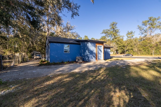 garage featuring fence