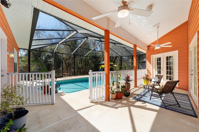 view of swimming pool featuring a fenced in pool, french doors, a patio, ceiling fan, and a lanai