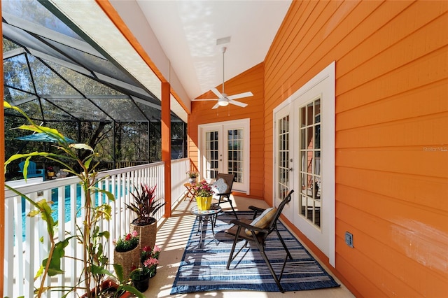 exterior space featuring ceiling fan, vaulted ceiling, and french doors