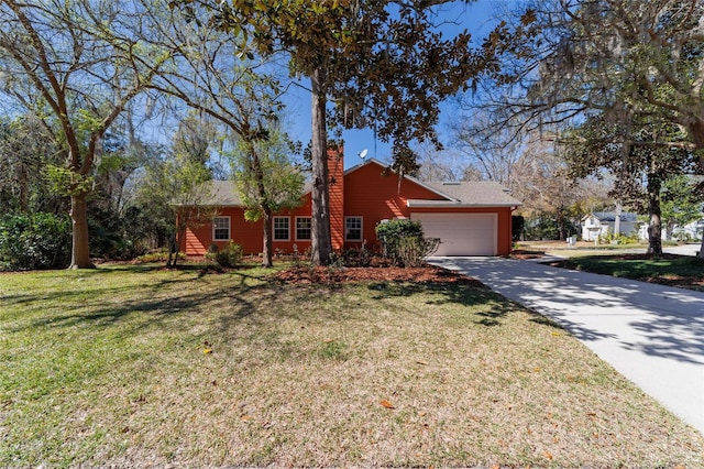 ranch-style house featuring an attached garage, a chimney, concrete driveway, and a front yard