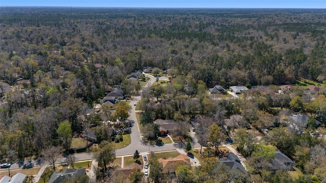 drone / aerial view with a forest view