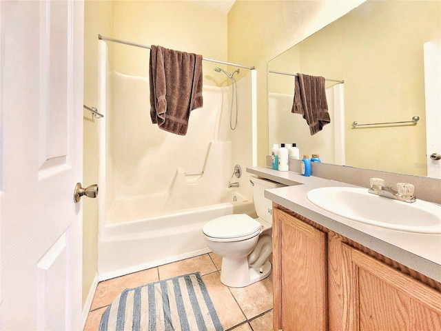 full bath featuring toilet, vanity,  shower combination, and tile patterned floors