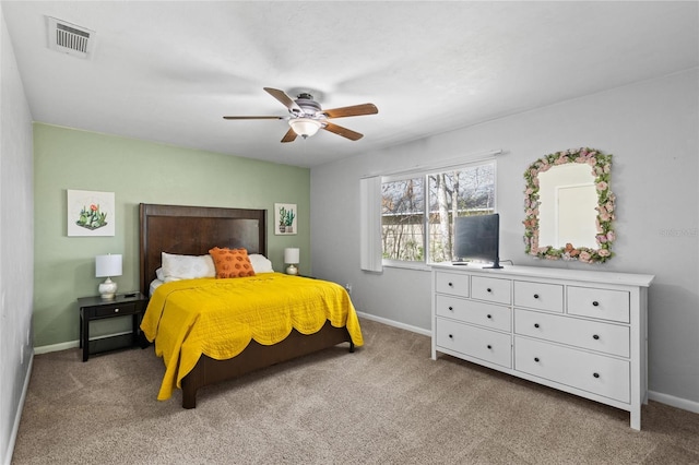 bedroom with light carpet, baseboards, and visible vents