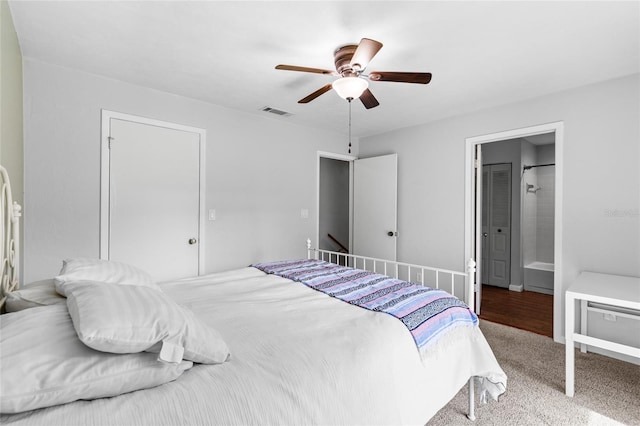 bedroom featuring carpet, visible vents, and a ceiling fan