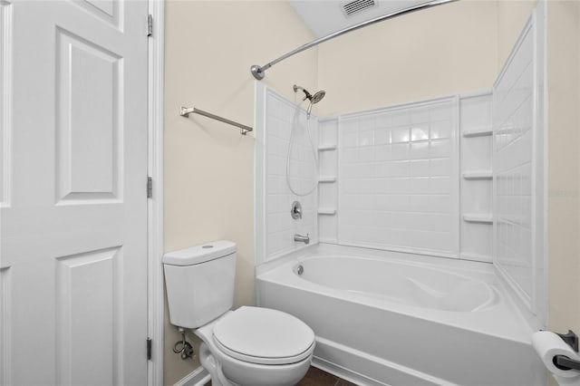 bathroom featuring shower / washtub combination, visible vents, and toilet