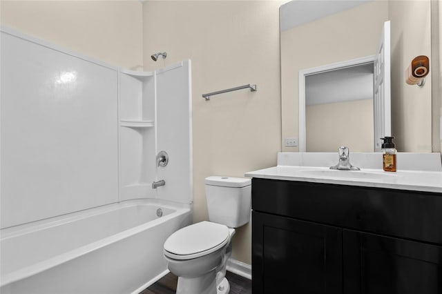 full bath featuring toilet, vanity, wood finished floors, and shower / bathing tub combination