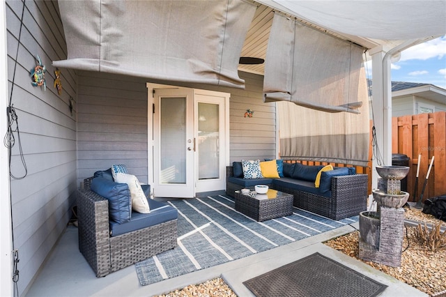 view of patio with fence and an outdoor living space