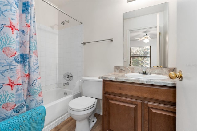 bathroom with toilet, shower / tub combo, wood finished floors, and vanity