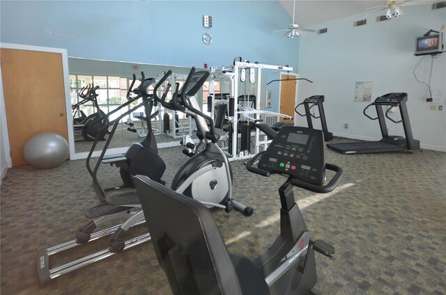 workout area featuring visible vents, a ceiling fan, carpet, and high vaulted ceiling