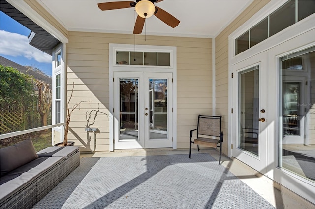 exterior space with ceiling fan and french doors