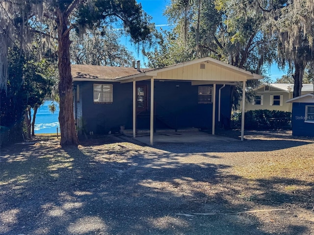 view of front of house featuring a carport