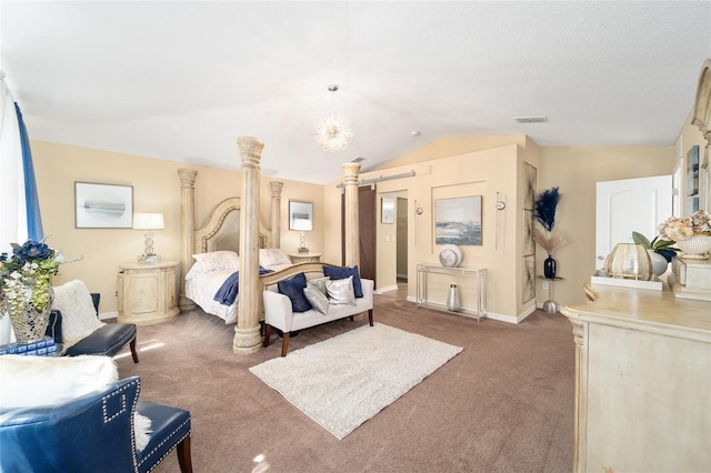 bedroom with a barn door, carpet flooring, visible vents, baseboards, and vaulted ceiling