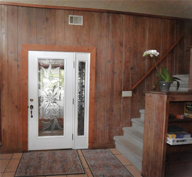 doorway to property featuring visible vents