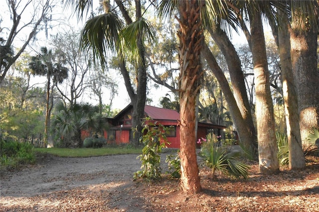 exterior space featuring metal roof