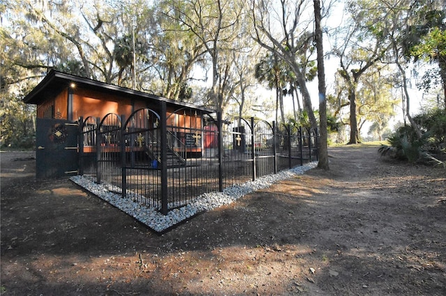 exterior space featuring a fenced front yard