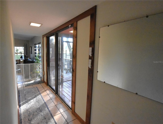 entryway featuring light tile patterned flooring