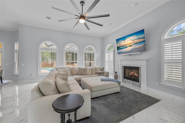 living area with a healthy amount of sunlight and marble finish floor