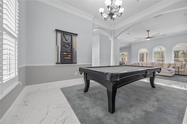 recreation room featuring arched walkways, marble finish floor, crown molding, and baseboards