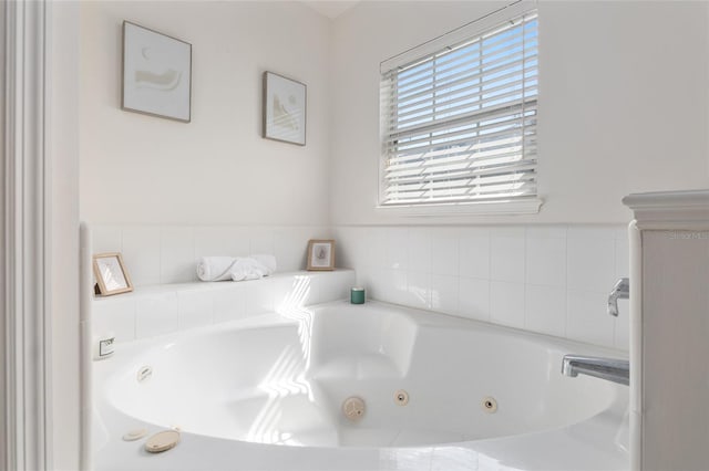 bathroom with a jetted tub