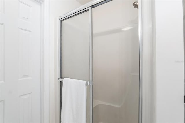 bathroom with a stall shower