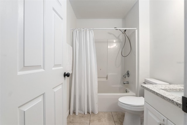 bathroom featuring shower / tub combo with curtain, vanity, toilet, and tile patterned floors