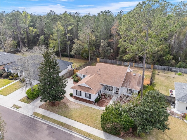 aerial view with a wooded view