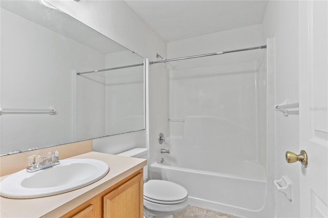 full bath with bathtub / shower combination, vanity, and toilet