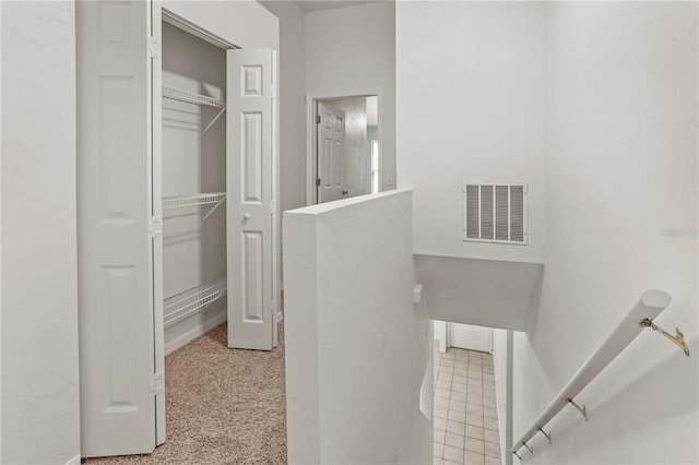 spacious closet with carpet and visible vents