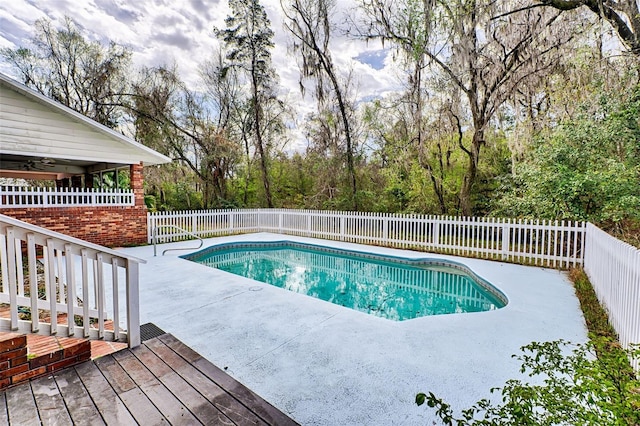 view of swimming pool featuring a patio, a fenced backyard, and a fenced in pool